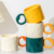 Ceramic cup with a heart - shaped handle