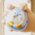 Stress - relieving squishy bubble - blowing figurine