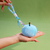 Apple Squeeze Decompression Pendant