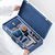 5-Piece Set: Massage Gun, Office Mug and Notebook